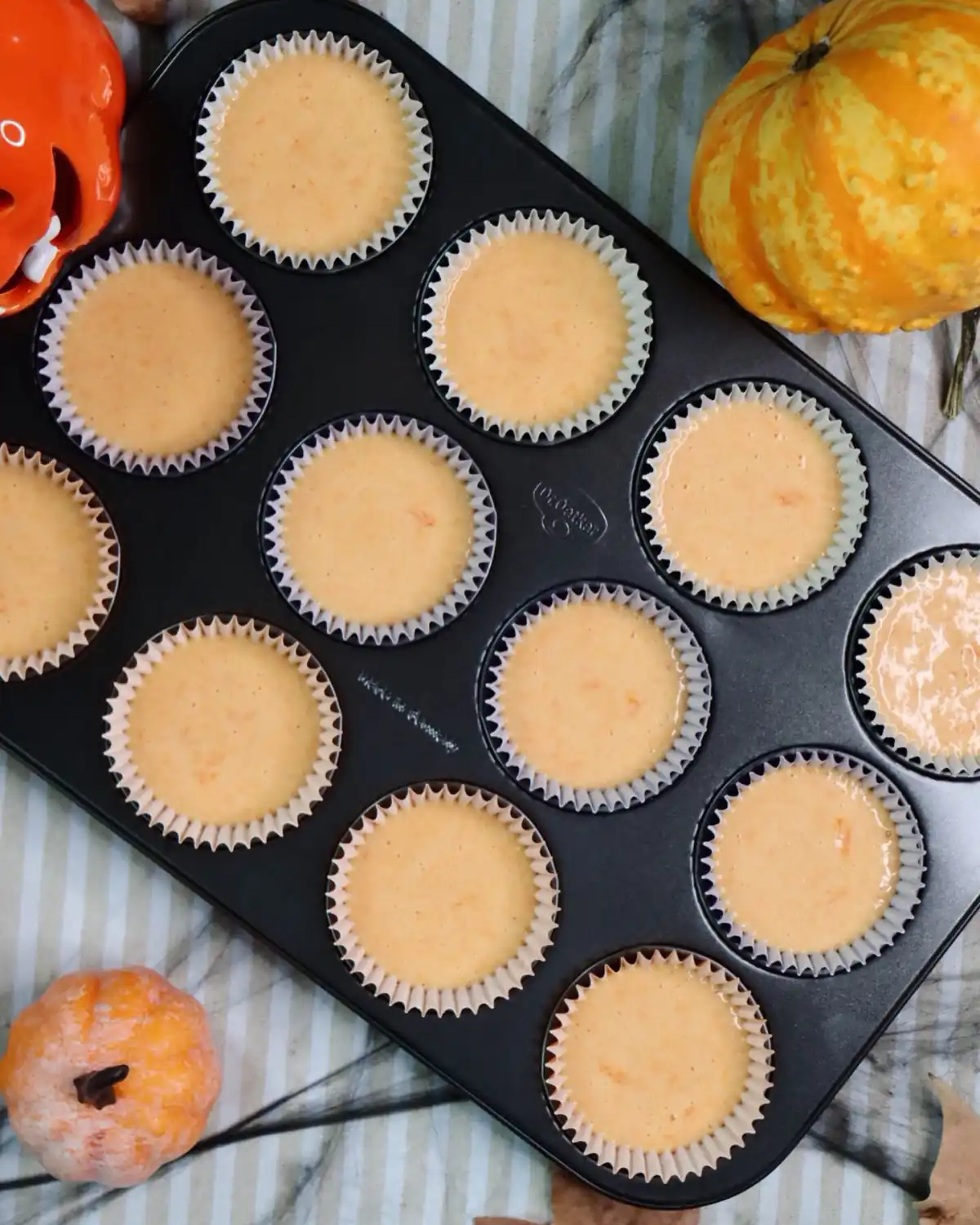 romisbakes recipe Scary Pumpkin Cupcakes